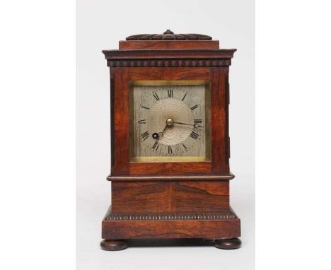 A ROSEWOOD TABLE TIMEPIECE, early to mid 19th century, the single barrel movement with 3" silvered dial with Roman numerals, 