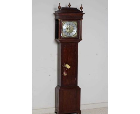 AN OAK LONGCASE BY THOMAS CLARE WARRINGTON, the eight day movement with anchor escapement striking on a bell, 12" square bras