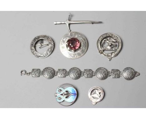 A COLLECTION OF SCOTTISH SILVER JEWELLERY comprising a John Hart Iona Graham clan badge, a Claymore kilt pin, Edinburgh 1974,