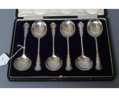A SET OF SIX CHIPPENDALE PATTERN SILVER SOUP SPOONS by Josiah Williams &amp; Co., London 1918, 8ozs 16dwts total, cased (Est.