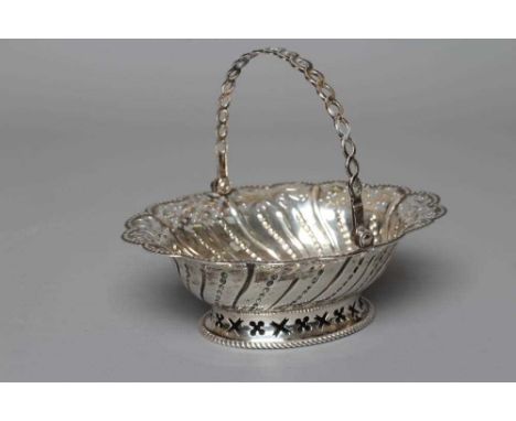 A GEORGE III SILVER EPERGNE BASKET by Charles Aldridge &amp; Henry Green, London 1773, of oval form, the overhead spectacle c