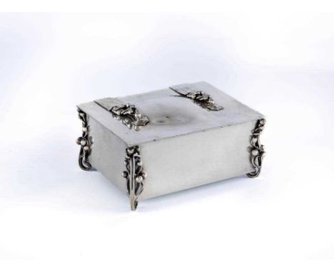 AN EDWARDIAN ARTS AND CRAFTS SILVER CIGARETTE CASKET by William Hutton, London 1904, possibly designed by Kate Harris, of obl