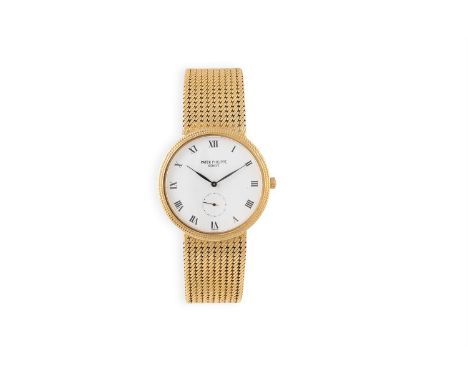 AN 18K GOLD 'CALATRAVA' MANUAL WIND BRACELET WATCH, BY PATEK PHILIPPE18-jewel Cal-215 manual wind movement, adjusted to heat,