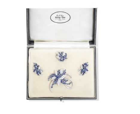 A SAPPHIRE AND DIAMOND SPRAY BROOCH, RING AND EARCLIP SUITE, CIRCA 1960The brooch designed as a bouquet of flowers, the bloom