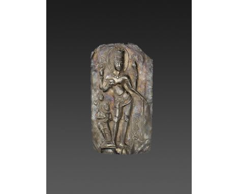 A LARGE CHAM SILVER REPOUSSE PLAQUE DEPICTING VISHNU AND CHILDChampa, 15th-16th century. The plaque finely executed in repous