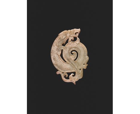 A WELL-DETAILED CARVING OF A DRAGON AND A PHOENIX IN PALE GREEN JADEJade. China, late Eastern Zhou, early Western Han period,