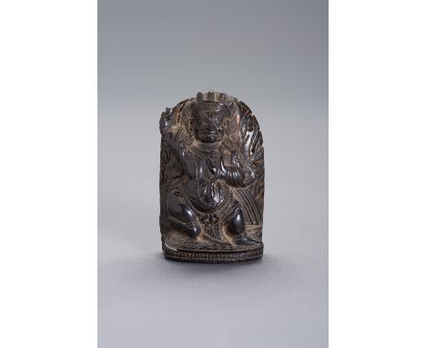 A SMALL AND FINE BUFFALO HORN STELE OF VAJRAPANISino-Tibetan, 19th century. Vajrapani, "holder of the thunderbolt" is lively 