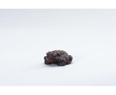 SHIGETADA: A WOOD NETSUKE OF A TOADBy Shigetada (Yoshitada), signed ShigetadaJapan, early 19th century, Edo period (1615-1868