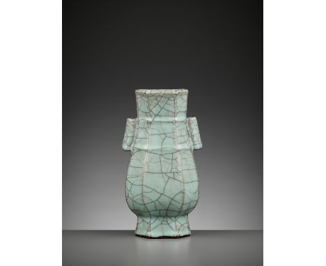 A GUAN-TYPE OCTAGONAL VASE, BA FANGHU, MID-QINGChina, 18th century. The pear-shaped body rising supported on a spreading foot