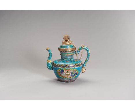 A CLOISONNE ENAMEL EWER AND COVERChina, late Qing Dynasty (1644-1912) to Republic period (1912- 1949). In the shape of a Tibe