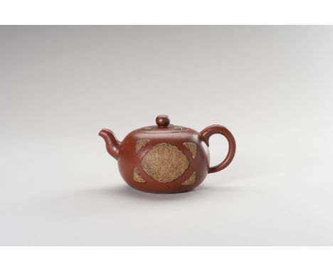 A YIXING CERAMIC TEAPOT AND COVERChina, Republic period (1912-1949). The pot of compressed globular form with curved spout an