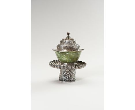 A SILVER AND JADE BUTTER TEA SETTibet, the silver parts date to 19th century, the jade bowl dates to around 1900. The silver 