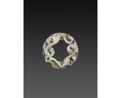 A HAN JADE RING ORNAMENT WITH COILED CHILONGJade. China, Han dynasty, 1st century BC - 1st century ADThe strong impact of thi