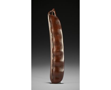 A WOOD SASHI NETSUKE OF AN EDAMAME BEAN PODJapan, 19th century, Edo period (1615-1868)Naturalistically carved and finely stai