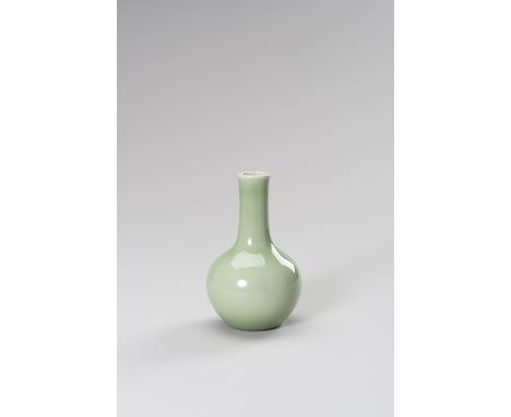 A SMALL LIGHT GREEN GLAZED VASE, YUHUCHUNPINGChina, Republic period (1912-1949). The small vase of a pear-shaped body rising 