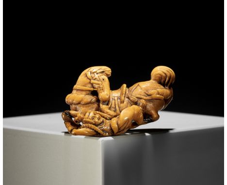 GENRYOSAI MINKOKU I: A RARE IVORY NETSUKE OF A HORSE AND GROOMBy Genryosai Minkoku I, signed Minkoku 民谷Japan, Edo (Tokyo), la