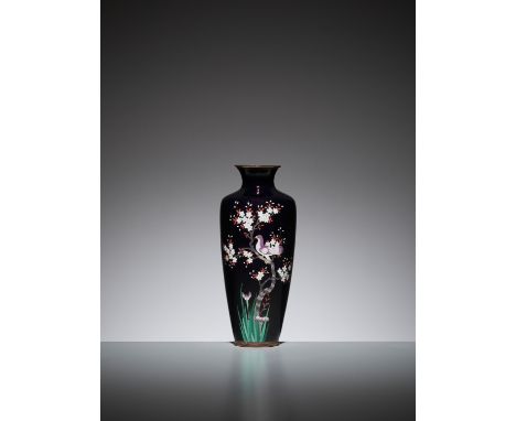 A MIDNIGHT BLUE CLOISONNE ENAMEL VASE WITH A PIGEONJapan, Meiji period (1868-1912)The baluster body rising from a short foot 