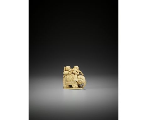 AN IVORY NETSUKE OF AN ELEPHANT PARADEJapan, 19th century, Edo period (1615-1868)The delicately engraved ivory netsuke with a