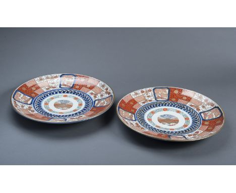 A PAIR OF IMARI-PLATES WITH BROCADE ORNAMENTJapan, 19th centuryVery attractive impressively colorful pair of plates! In back 