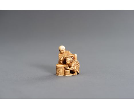 HOMIN: AN IVORY NETSUKE OF A COUPLE PREPARING MISOBy Homin, signed Homin with kakihan Japan, second half of 19th centuryThe s