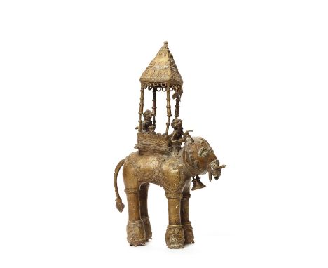 A BASTAR BRONZE OF UNIQUE ELEPHANT WITH GODDESSIndia, 19th-20th century. This beautifully decorated elephant is a true master