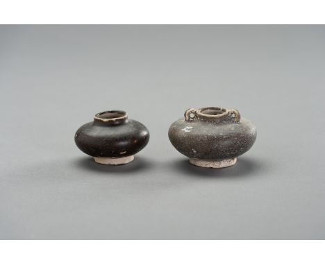 TWO GLAZED CERAMIC 'SHIPWRECK' POTSSouthern China, 12th-14th century. Two brown glazed ceramic pots on a ring base, globular 