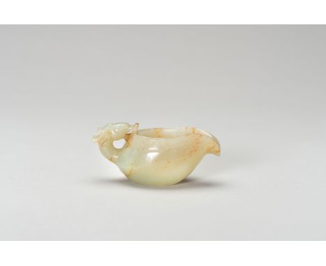 AN ARCHAISTIC CELADON JADE MINIATURE POURING VESSELChina, late Qing Dynasty (1644-1912) to Republic period (1912-1949). Suppo