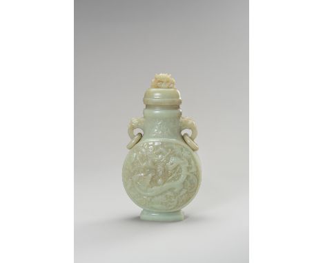 A LARGE CELADON JADE 'DRAGON' VASE AND COVERChina, late Qing Dynasty (1644-1912) to Republic period (1912- 1949). Each side d