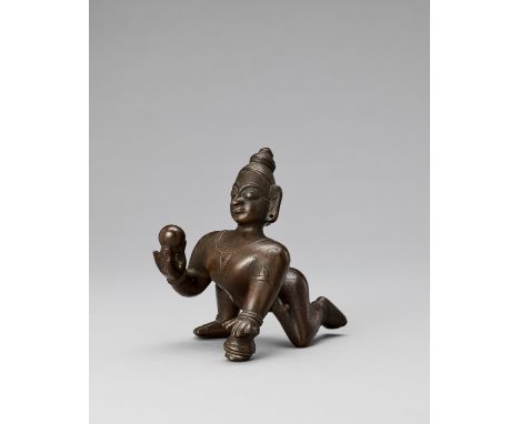 A HEAVILY CAST BRONZE FIGURE OF BALAKRISHNA, 18TH-19TH CENTURYIndia. Depicting Krishna as the Divine Baby, known as Balakrish