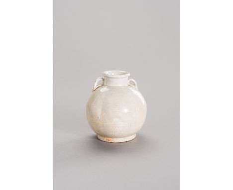 A MELON-SHAPED, WHITE-GLAZED CERAMIC JARLETChina, Northern Song dynasty, 11th-12th century. The lobed body raised on a short 