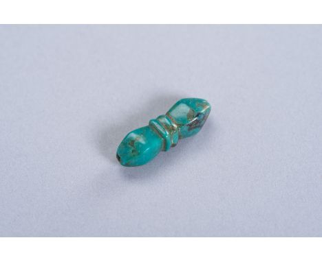 A TURQUOISE MINIATURE PENDANT OF A THUNDERBOLT SCEPTREChina, presumably Ming Dynasty (1368-1644). The turquoise of a beautifu