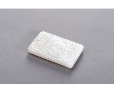 A WHITE JADE PLAQUE WITH GARDEN SCENEChina, Republic period (1912-1949) or later. Of rounded rectangular form, pierced toward