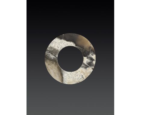 A JADE RING, QIJIAJade. China, Qijia culture, c. 2200-1600 BCThe exquisitely multicolored jade showing numerous striations, d