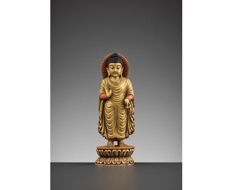 A TIBETAN-CHINESE PAINTED AND GILT IVORY FIGURE OF BUDDHA, LATE MING TO EARLY QING DYNASTY17th-18th century. Masterfully carv