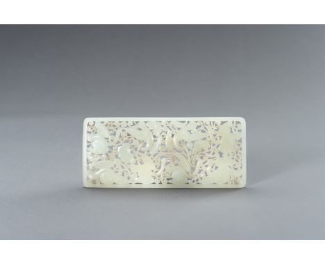 A RETICULATED YUAN STYLE PALE CELADON JADE PLAQUEChina, late Qing Dynasty (1644-1912). The panel of rectangular shape and rou