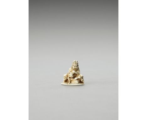 GYOKUSAI: AN IVORY NETSUKE OF EMMA-O FEEDING TWO ONIBy Gyokusai, signed GyokusaiJapan, Meiji period (1868-1912)The king of he