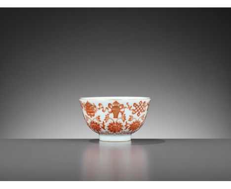 AN IRON-RED AND GILT-DECORATED 'BAJIXIANG' BOWL, DAOGUANG MARK AND PERIODChina, 1821-1850. The deep rounded sides rising from