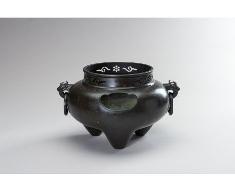 A LARGE SHISOU SILVER INLAID BRONZE TRIPOD CENSERChina, Qing Dynasty (1644-1912). Of bombe-shape, flanked by Kirin-shaped rin