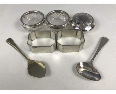 A pair of silver collared salts together with a pair of electroplate napkin rings and a snuff box etc