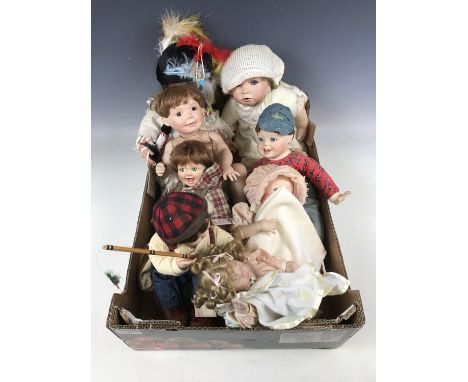 Eight ceramic collectors' dolls