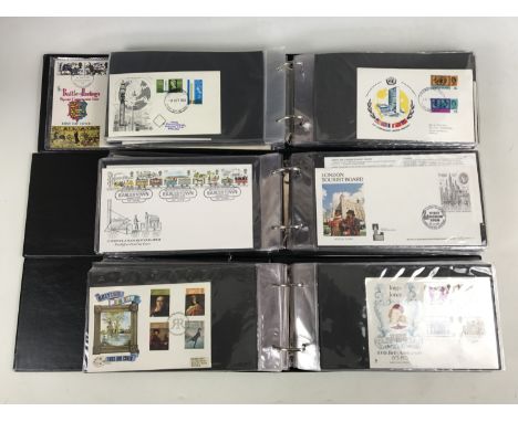 Three Stanley Gibbon cover albums containing a quantity of GB First Day Covers, circa 1940-1983, including 1946 Victory Comme