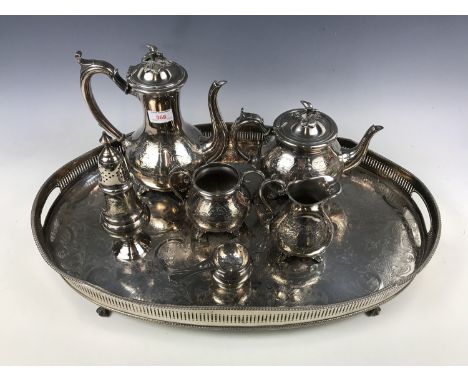 An electroplate tea and coffee service together with a sugar castor, a tea strainer and a large oval galleried tea tray