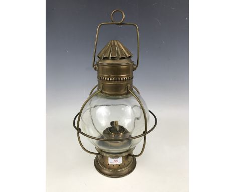 A ship's brass pendant masthead oil lamp