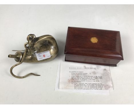 A brass pendant oil lamp together with a reproduction marquetry inlaid mahogany musical box