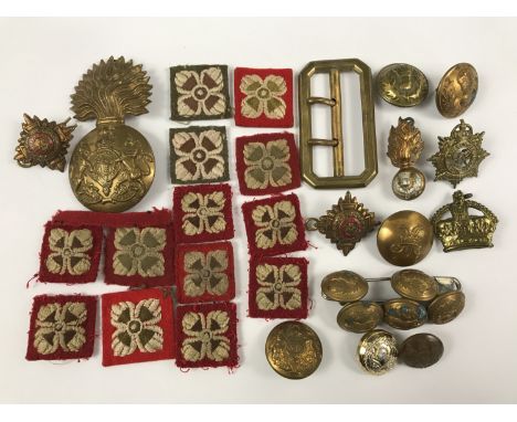 A small quantity of British army rank pips, a Royal Scots Fusiliers cap badge etc