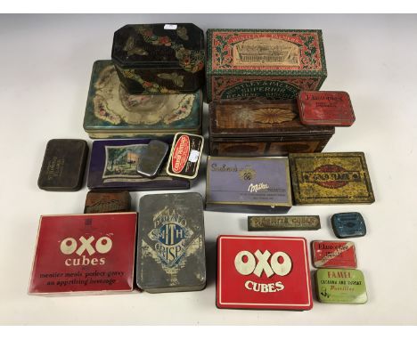 A quantity of vintage tins and packaging including an early 20th Century Huntley and Palmers ginger nuts tin