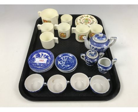 A child's ceramic blue-and-white tea set together with one other