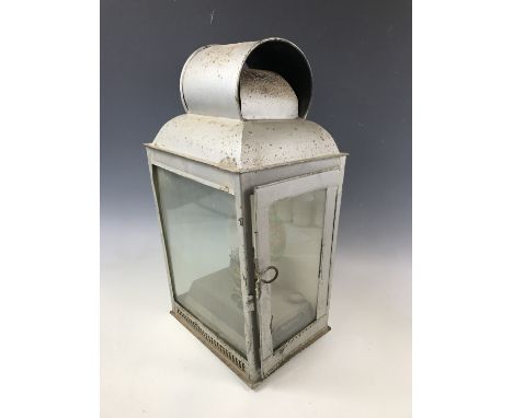 A late 19th Century wall mounting three glass oil lamp