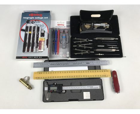 A cased Anker Reisszeuu compass instrument set together with an Elel digital calliper, a Moore & Wright calliper and a Swiss 