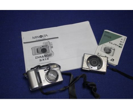 A MINOLTA DIGITAL CAMERA WITH INSTRUCTION MANUAL ALONG WITH A SMALL CANON CAMERA